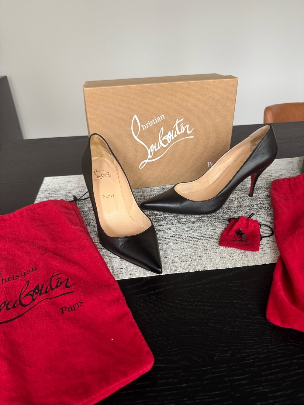 Christian Louboutin Black Leather Pointed Pumps with Red Sole